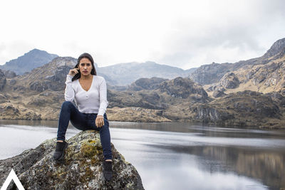 Portrait of man in mountains against sky