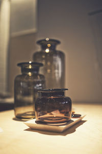 Close-up of glass jar on table at home