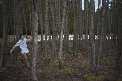 Man running in forest