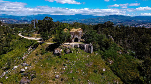 High angle view of castle on landscape against sky