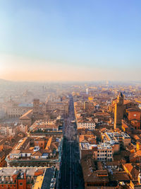 Aerial view of city buildings against clear sky