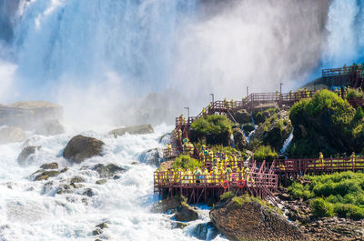 Panoramic view of waterfall against sky