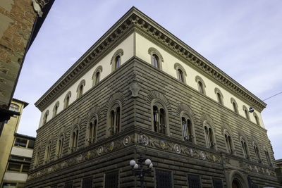 Low angle view of historic building against sky