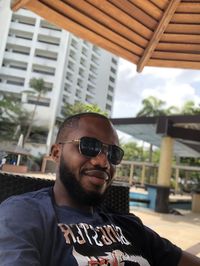 Portrait of young man wearing sunglasses