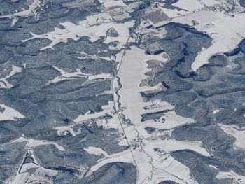 Aerial winter snow landscape rural   minnesota and indianapolis contrast between snow covered fields