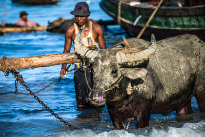 Man standing on rope