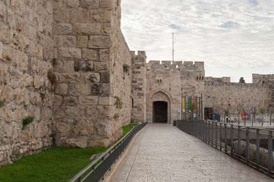 View of historical building against cloudy sky