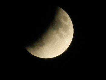 Low angle view of moon against sky at night