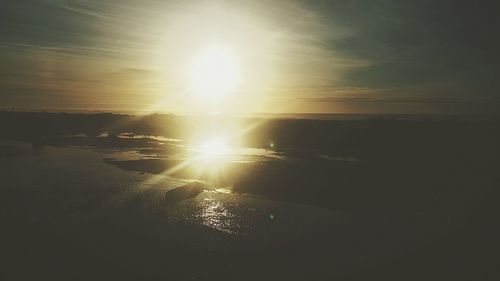 Scenic view of sunset over river