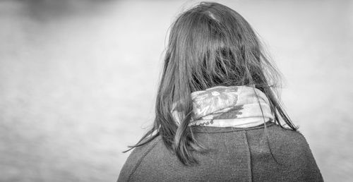 Rear view of girl against blurred background