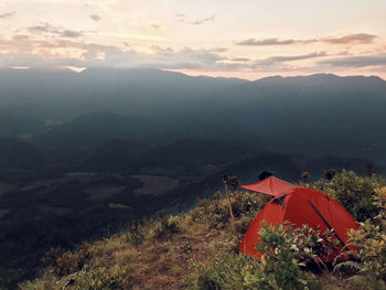 Scenic view of mountains against sky during sunset