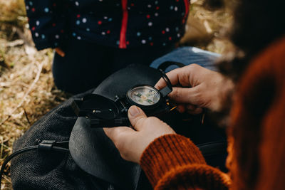 Woman holding compass