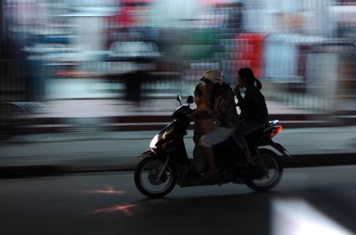 Man cycling on road