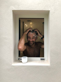 Portrait of young woman in bathroom
