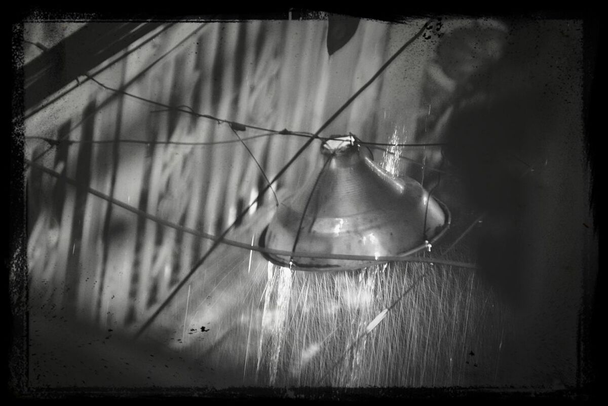 transfer print, auto post production filter, indoors, close-up, hanging, no people, metal, electricity, focus on foreground, day, glass - material, pattern, window, lighting equipment, transparent, home interior, reflection, frame, selective focus, still life