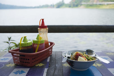 Fruits in basket on table