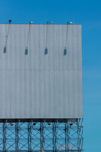 Low angle view of building against blue sky