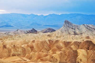 Scenic view of rocky mountains against sky