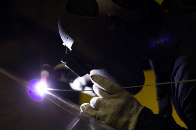 Man working on metal in workshop