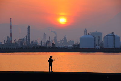 Sunset and angler