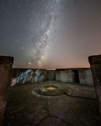 Old building against sky at night