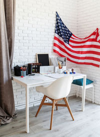 Chairs and table against wall at home