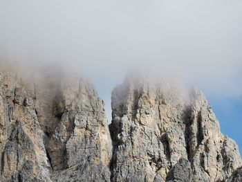 Panoramic view of rocky mountains against sky