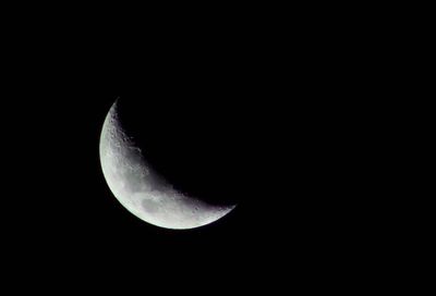 Low angle view of moon in sky