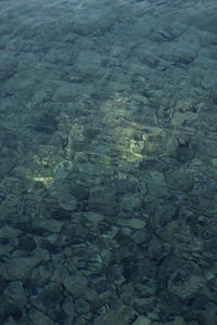 Full frame shot of stones in sea