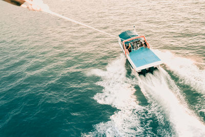 High angle view of man surfing in sea