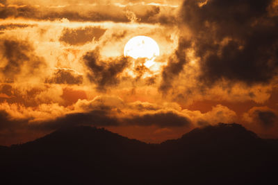 Low angle view of cloudy sky during sunset