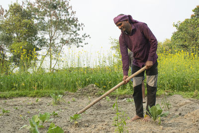 Man working on field