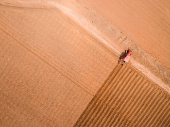 Aerial view of tractor in field