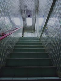 Staircase on escalator