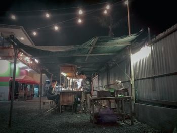 Interior of illuminated industry at night