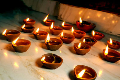 The traditional clay diya lamps lit during diwali celebration