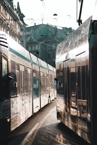 Train at railroad station in city