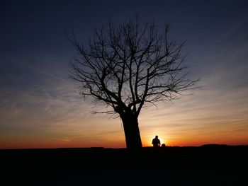 Silhouette of man at sunset