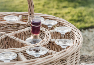 Close-up of wicker basket on beach