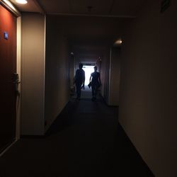 People walking in corridor