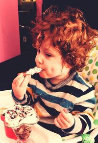 Close-up of boy eating ice cream