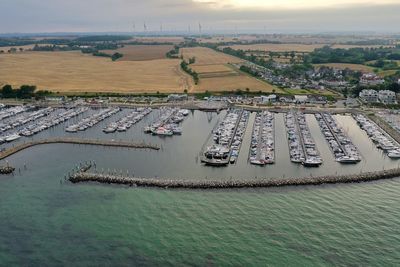 High angle view of commercial dock against sea