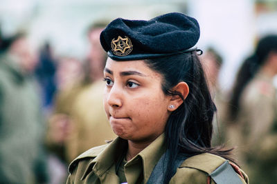 Portrait of young woman looking away