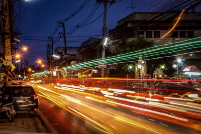 Light trails on city street at night