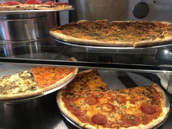 Close-up of pizza on table in restaurant