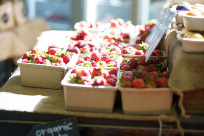 Flower pots for sale at market stall