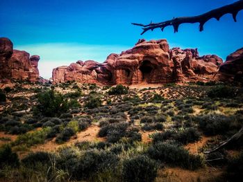 Low angle view of rock formation against clear sky