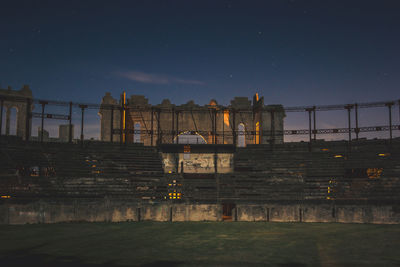 Abandoned building against sky at night