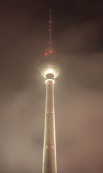 Low angle view of fernsehturm tower against sky