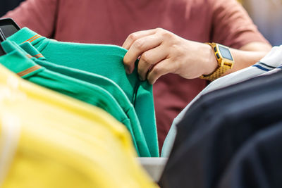 Close-up of man holding hands